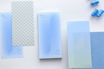 Dreamy Island Notepad Set - 90 Sticky Notes featuring kawaii blue and checkered designs, including pastel blue sea-themed patterns with relaxing quotes.