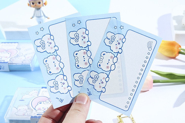 Toffee Diary Sticky Notepad with PVC Card Holder featuring cute kawaii-style designs of a blue cartoon animal.