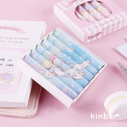 Cinnamoroll Notepad Set with 4 Designs, 48 Pages each, featuring cute and colorful Cinnamoroll illustrations on pastel blue backgrounds, displayed on a pink surface with other kawaii stationery.