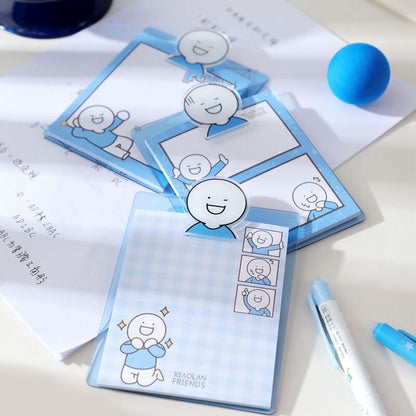 Blue Friend Sticky Notepad with PVC Clip Holder featuring cute cartoon characters on blue and white background, perfect for kawaii stationery collection.