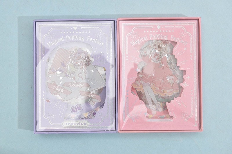 Magical Silver Foil Stickers for Planners and Crafts, featuring whimsical characters in pastel pink and purple packaging.