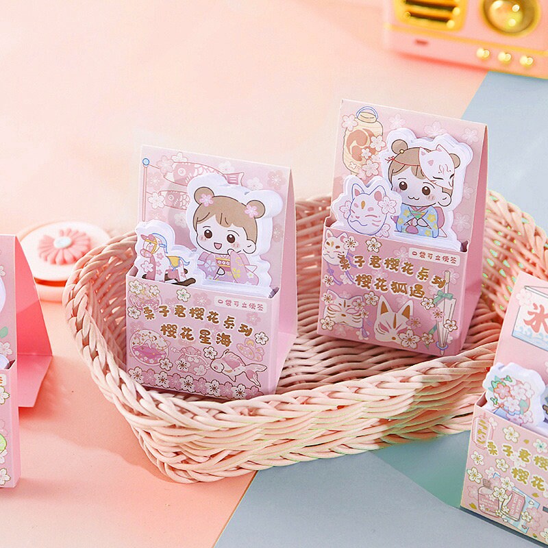 Kawaii Girl Sticky Notepad - 60 Pages featuring adorable cartoon characters in pastel pink packaging, perfect for cute and functional kawaii stationery needs.