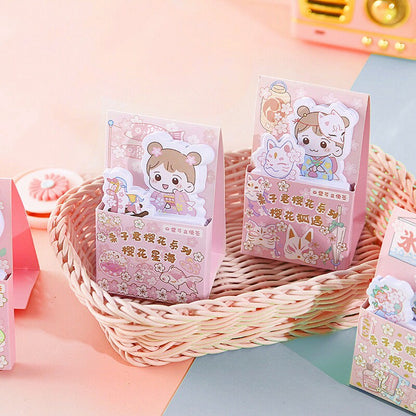 Kawaii Girl Sticky Notepad - 60 Pages featuring adorable cartoon characters in pastel pink packaging, perfect for cute and functional kawaii stationery needs.