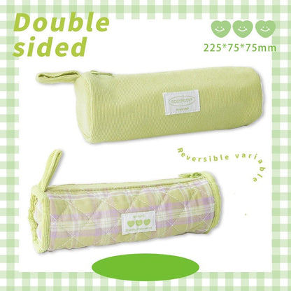 Double-Sided Milky Cream Fabric Pencil Case in green with quilted and plain sides, featuring a sturdy zipper and convenient carry handle, perfect for kawaii stationery lovers.