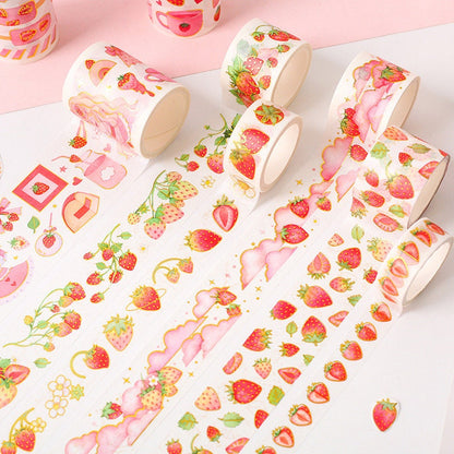 Strawberry washi tape roll with cute and colorful strawberry designs, perfect for parties, crafts, scrapbooking, and journaling.