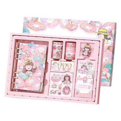 Dorothy Planner Gift Set featuring a journal, stickers, washi tape, and cute kawaii accessories in a pink floral theme.