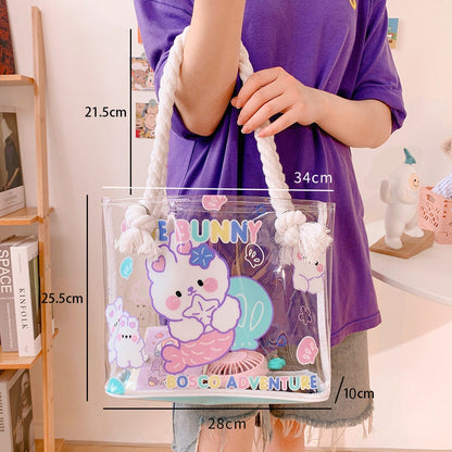 Clear vinyl tote bag with cute animal design, featuring rope handles, colorful bunny graphics, and "Bunny Bosco Adventure" text. Perfect for kawaii fashion and everyday use.