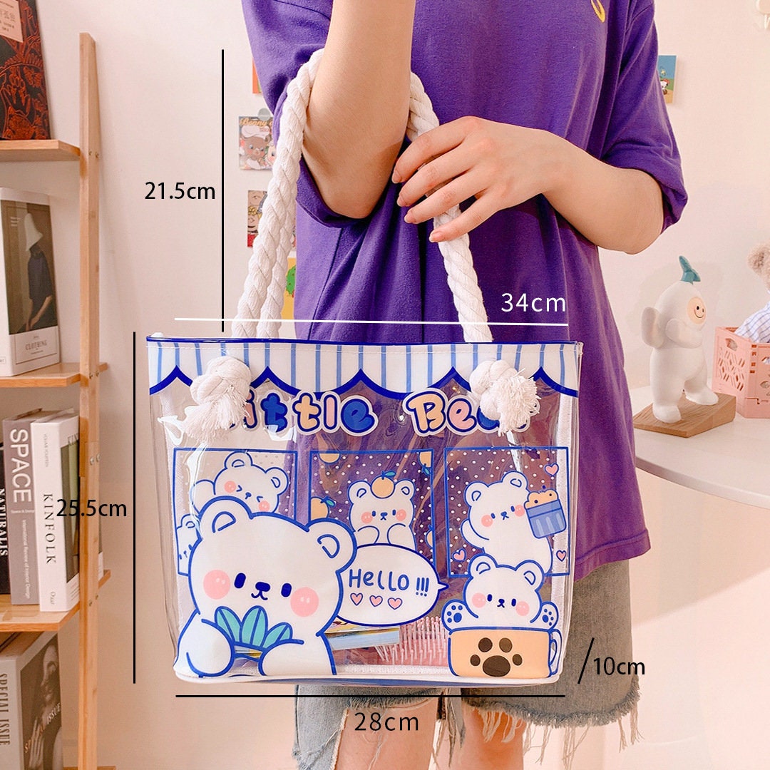 Clear vinyl tote bag with animal design featuring cute white bears, dimensions 34cm x 28cm x 10cm, ideal for kawaii stationery and accessories.