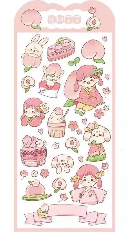 Kawaii gold foil jelly stickers featuring cute characters like bunnies, puppies, and girls in kimonos, along with sweet treats, peach designs, and floral elements. Perfect for craft and DIY projects.