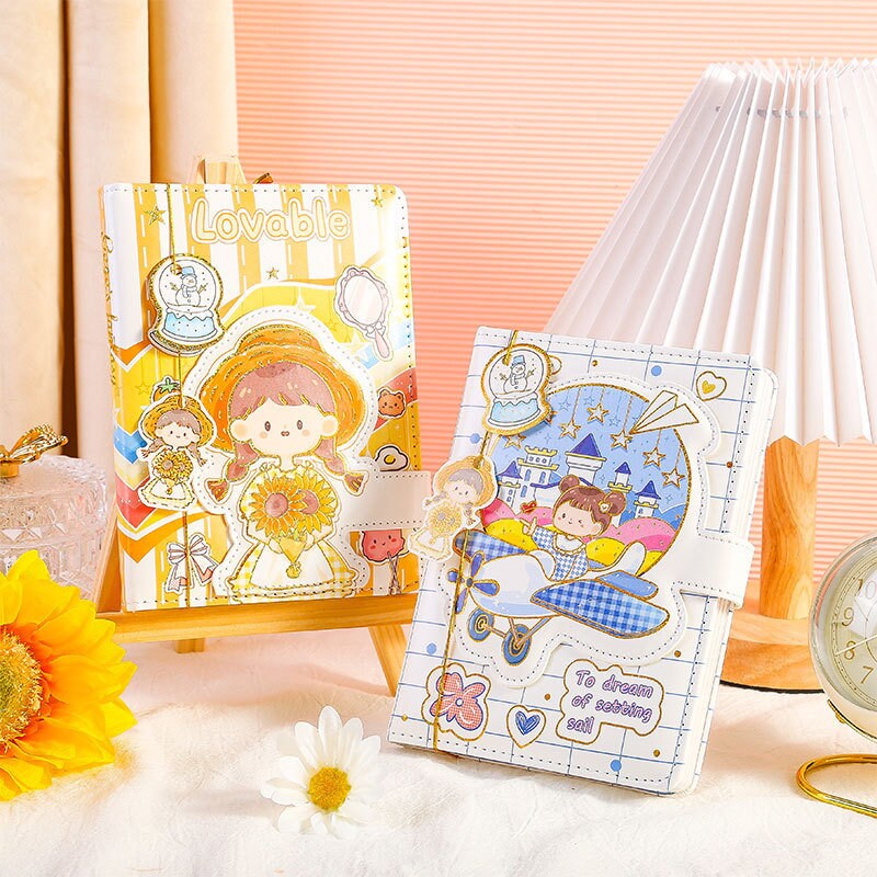 Dreamy Girl Leather Journal with Magnetic Buckle featuring cute kawaii illustrations, two designs shown, perfect for stationery lovers.