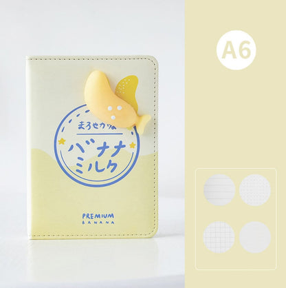 Banana Soft Leather Journal - DIY Planner, A6 size, with cute banana charm on cover. Premium banana-themed design in pastel yellow, featuring Japanese text and various page layout options. Perfect for kawaii stationery lovers.