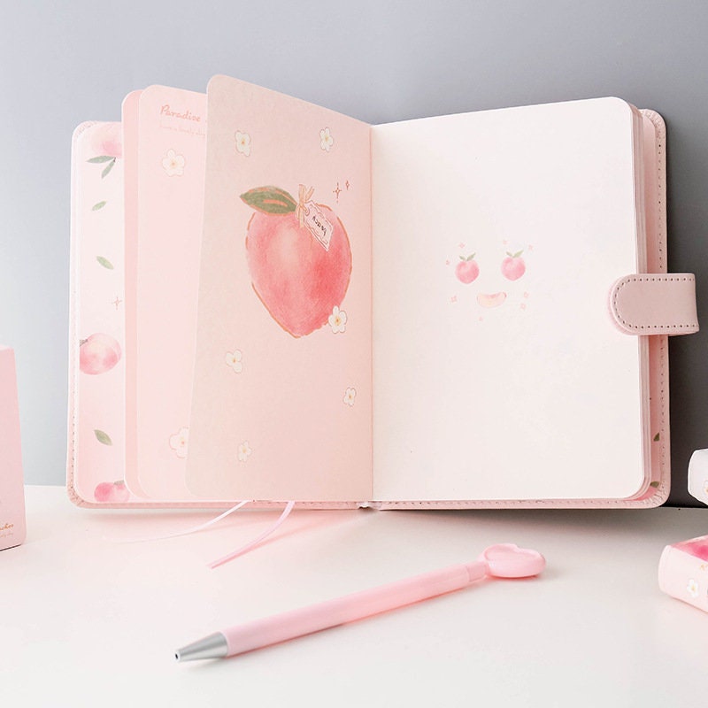 Pink Peach Leather Planner A5 with Magnetic Closure, 228 Pages, Open on Desk with Peaches and Floral Illustrations, Kawaii Stationery