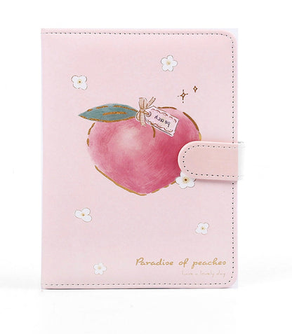 Pink A5 peach leather planner with a magnetic closure and 228 pages, adorned with a cute peach illustration and floral design, featuring "Paradise of peaches" and "have a lovely day" text.