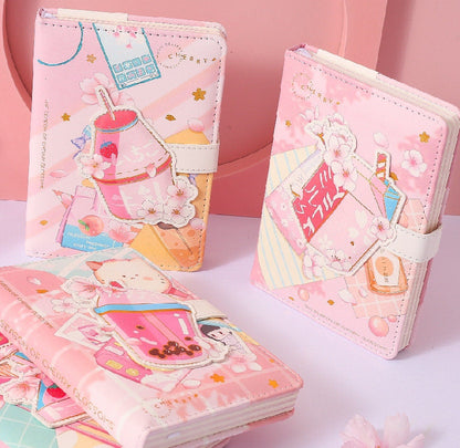 Pink Dessert Leather Journal with Magnetic Buckle featuring kawaii cherry blossom and dessert-themed illustrations.