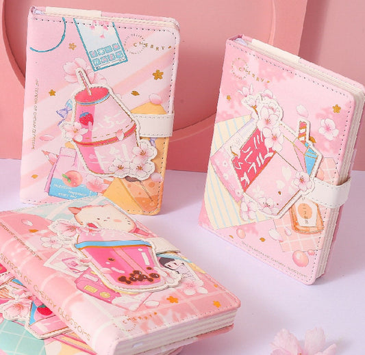 Pink Dessert Leather Journal with Magnetic Buckle featuring kawaii cherry blossom and dessert-themed illustrations.