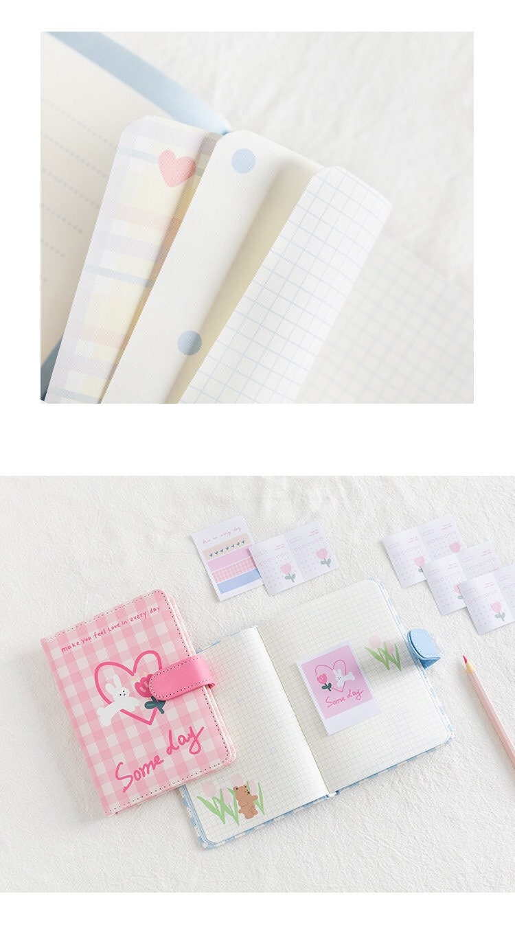 Magnetic Buckle Leather Grid Planner - Blue A6 Notebook with colorful grid, polka dot, and heart-patterned pages, including additional cute sticky notes and pastel pencil.