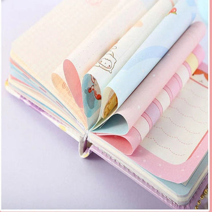 Kawaii A6 leather journal with magnetic buckle and bookmark, showing colorful pages with cute illustrations and designs.