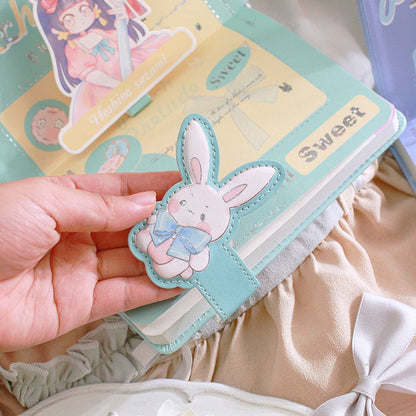 Kawaii Peach Prelude Leather Journal with Magnetic Buckle featuring a cute pastel bunny bookmark, perfect for note-taking and diary writing.