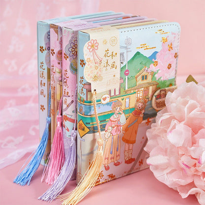 Cherry Blossom Planner with Soft Leather Cover and Magnetic Buckle, featuring colorful anime-style illustrations and tassels, available in multiple colors.