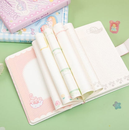 Millie's Leather Camping Journal with Colorful Pages, kawaii-style designs, and illustrations, shown open with whimsical interior pages on a pastel green background.