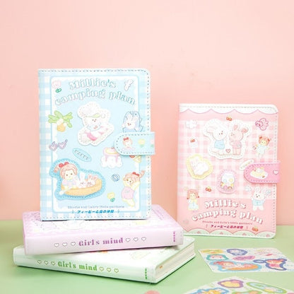 Millie's Leather Camping Journal with colorful pages in kawaii style, featuring charming animal and camping illustrations on the cover, available in blue and pink.