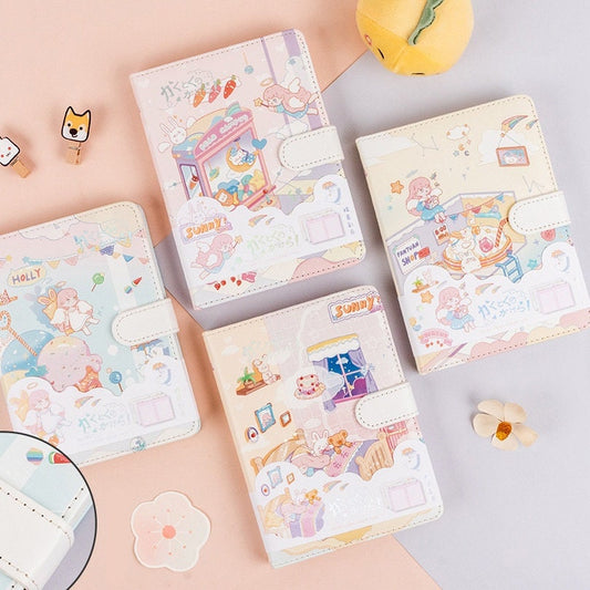 Sweet Dream Leather Journal for Girls with Magnetic Buckle featuring kawaii designs and pastel colors, surrounded by cute stationery items.