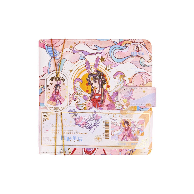 Star Beauty leather journal with vibrant, colorful design featuring a kawaii character, complete with a metal bookmark and detailed illustrations. Perfect for note-taking and journaling.