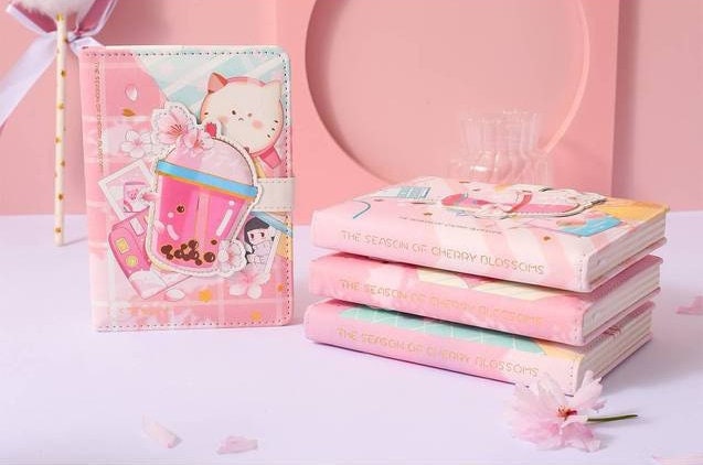 Pink Dessert Leather Journal with Magnetic Buckle featuring kawaii design of cat and bubble tea against a pastel pink background.