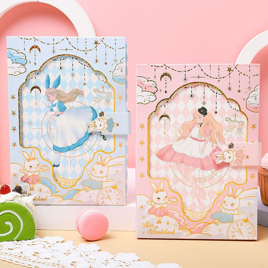 Alice Dream Journal - Gold Foil Leather Cover featuring pastel blue and pink designs, both adorned with whimsical Alice in Wonderland illustrations, gold foil accents, and cute bunny charms, perfect for kawaii stationary collectors.