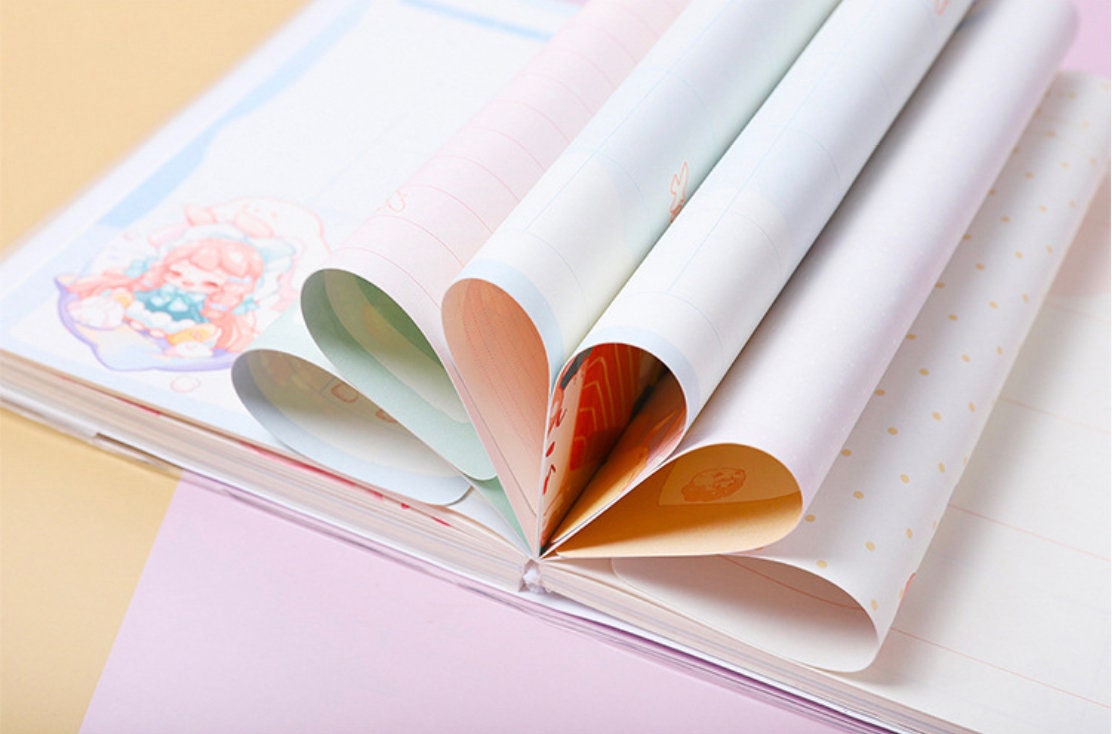 Cute Lolita PVC Buckle Notebook with colorful pages, 224 pages, A5 size, kawaii journal with heart-shaped folded pages.