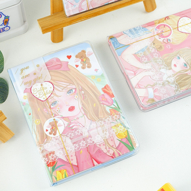 Fashion Macaron Girl Notebook with Bookmark and Buckle featuring kawaii-style illustrated girl on cover, floral accents, and cute bear details.