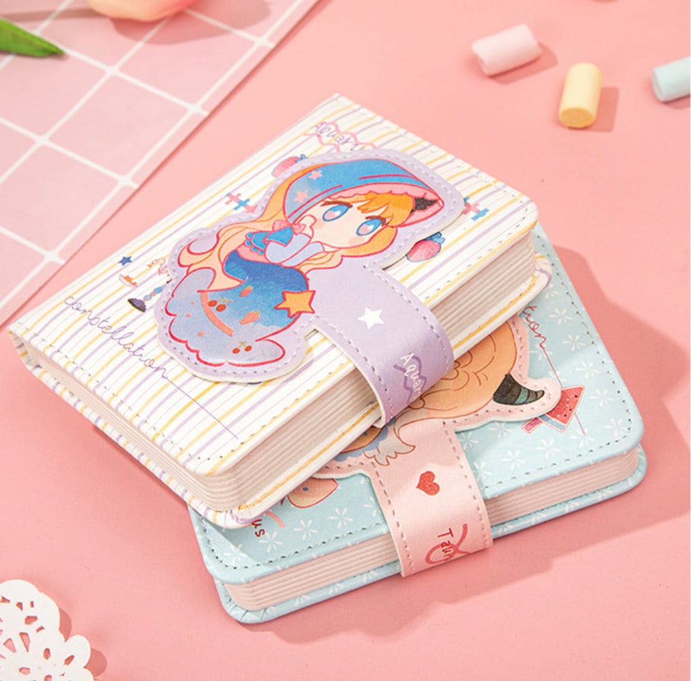 Zodiac leather journal with magnetic buckle design in kawaii style featuring cute illustrations of zodiac characters, perfect for stationery lovers, planners, and diary enthusiasts.