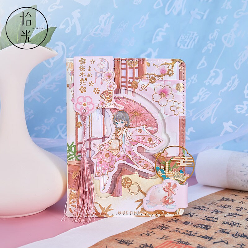 Cherry Blossom Girl Magnetic Buckle Hardcover Notebook featuring an elegant girl in traditional attire with a pink parasol, surrounded by cherry blossom designs, and a pink tassel bookmark; perfect for kawaii stationary lovers.