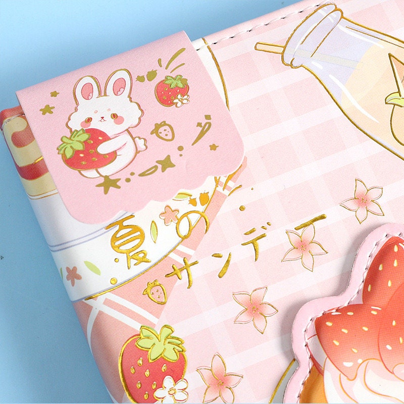 Summer Sundae Leather Journal with Magnetic Buckle - Cute Kawaii Pink Design Featuring Bunny Holding Strawberry and Japanese Text.