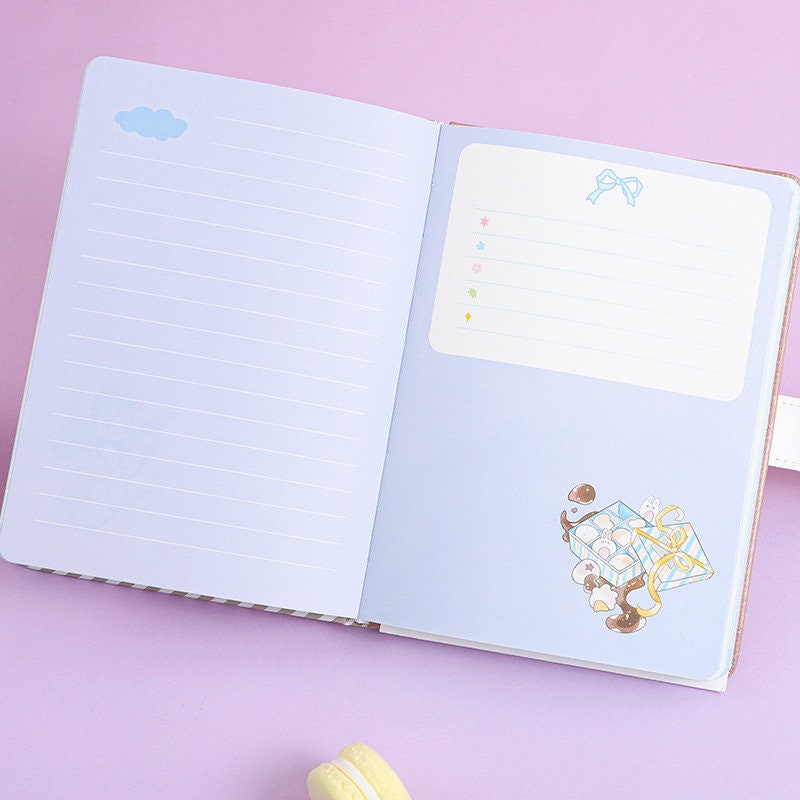 Ice Cream Van Leather Journal with Magnetic Buckle, open view showing kawaii-style lined pages and cute ice cream illustrations, perfect for cute stationery lovers.