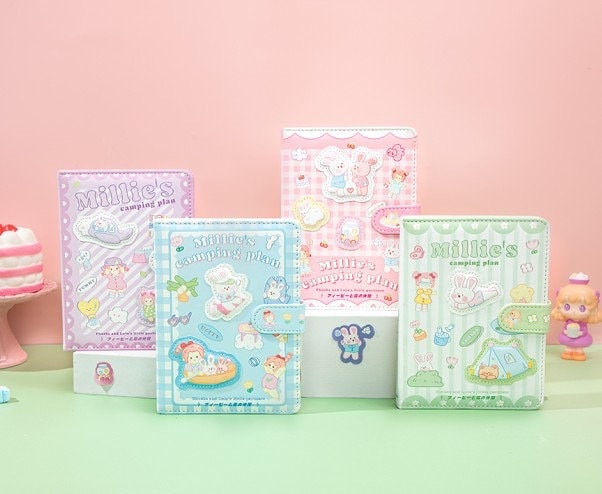 Millie's Leather Camping Journal with Colorful Pages in four pastel designs featuring kawaii camping-themed illustrations.