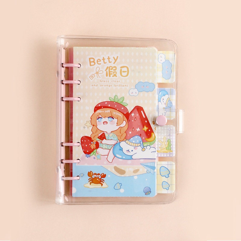 Betty's Vacation B6 Loose Leaf Planner in kawaii style featuring a cute illustration of a girl with strawberry hat, colorful pages, and clear cover