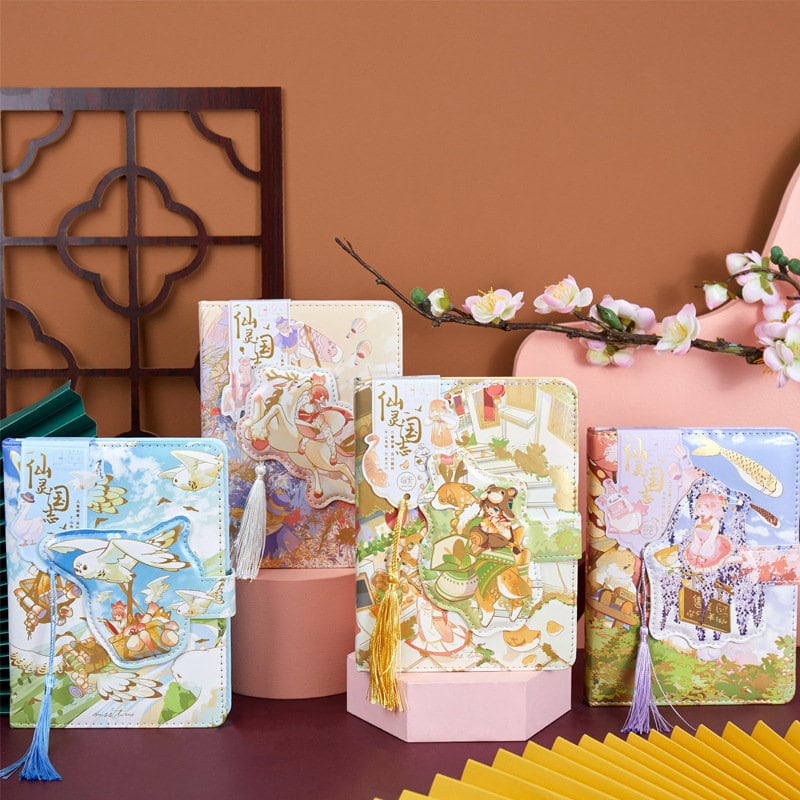 Magic World Leather Journal with Colorful Pages and Magnetic Buckle featuring whimsical illustrations and decorative tassels, perfect for note-taking and journaling in kawaii style.