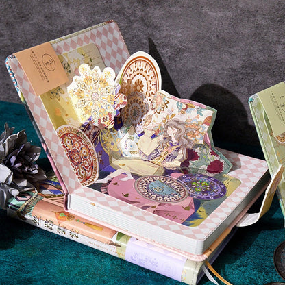 Silk Cloud Leather Journal with Bookmark - Magnetic Buckle featuring intricate, colorful pop-up designs with floral and fantasy elements, perfect for kawaii stationery lovers.