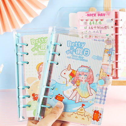 Betty's Vacation B6 Loose Leaf Planner with colorful kawaii illustrations featuring a cute girl and unicorn, transparent cover, and blue ring binders, perfect for organizing and planning.