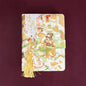 Magic World Leather Journal with Colorful Pages, featuring a whimsical design of a girl in a bear costume on the cover, adorned with a golden tassel and secured with a magnetic buckle.