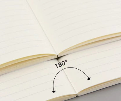 Collector's Edition Timeless Notebook - 100 Pages showing 180-degree flat lay open pages with lined paper.