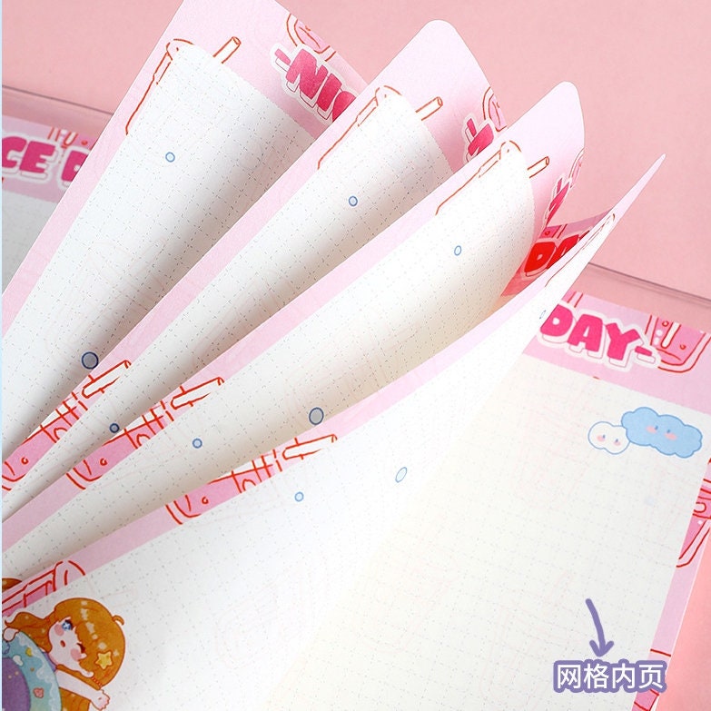 Betty's Vacation B6 Loose Leaf Planner with pink and white pages featuring cute illustrations, perfect for kawaii-style note-taking and planning.