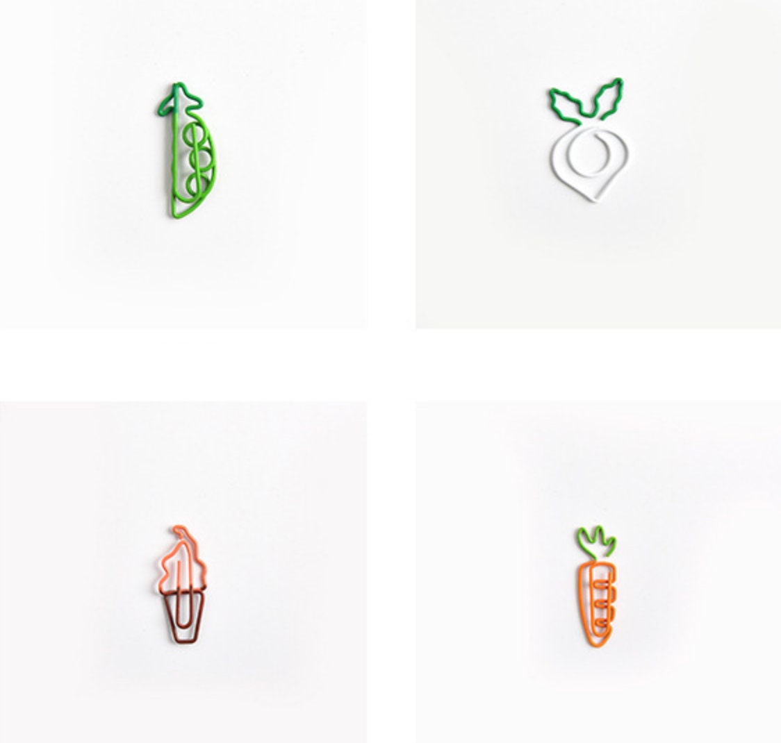 Creative vegetable-shaped paper clips in designs of a pea pod, radish, ice cream cone, and carrot; cute stationery and office supplies.