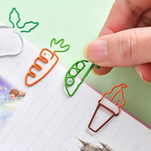 Creative vegetable-shaped paper clips in kawaii style, featuring designs like carrots, peas, and ice cream; perfect for cute stationery and office supplies.