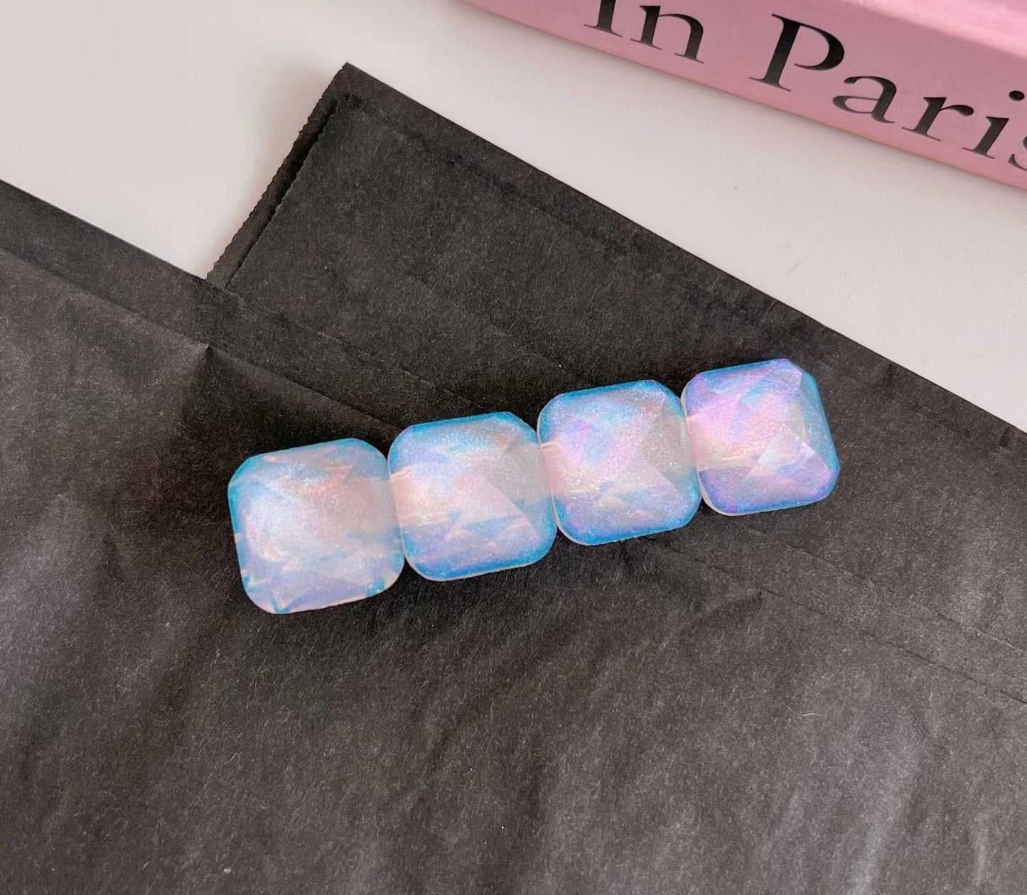 Acrylic resin heart snap clips in iridescent blue and pink for girls, perfect for back to school accessory.