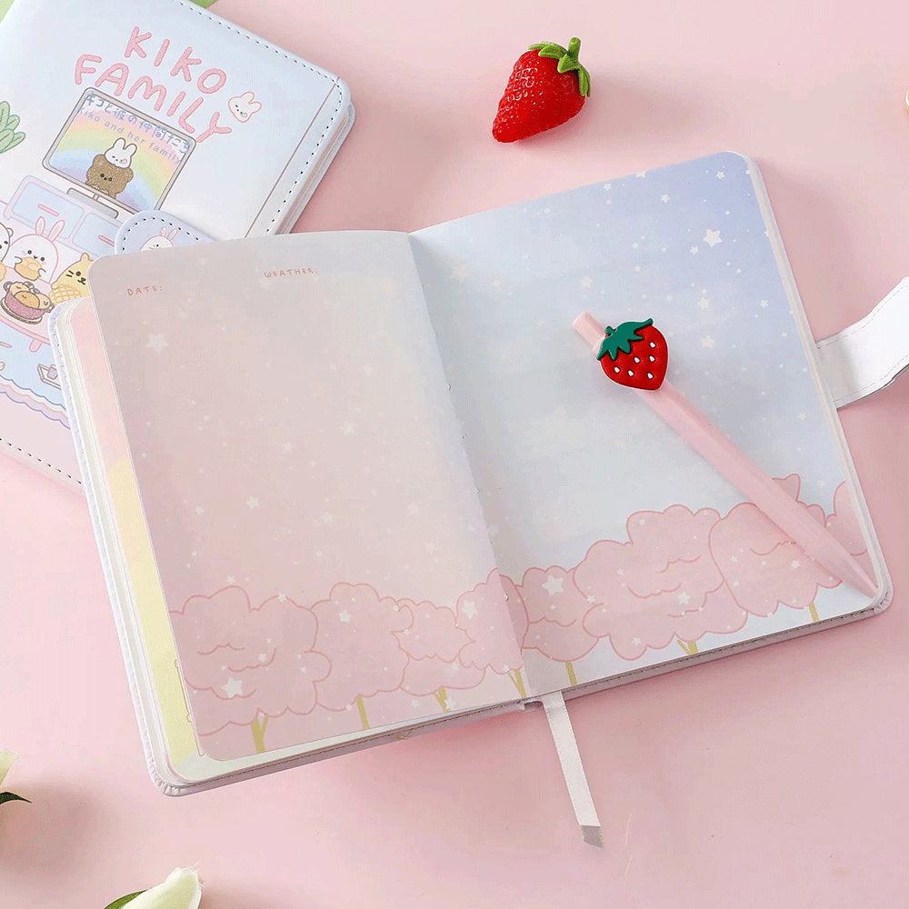 Purple and blue Kiko Family Leather Journal featuring an open page with whimsical pink cloud patterns, an attached pen holder, and a cute strawberry-shaped pen on a pink background. Ideal for kawaii stationery lovers.