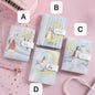 Anime Leather Journal - Girl Hugging Moon Design, pastel-colored kawaii stationery with four variations (A, B, C, D), featuring whimsical illustrations of a girl interacting with the moon.