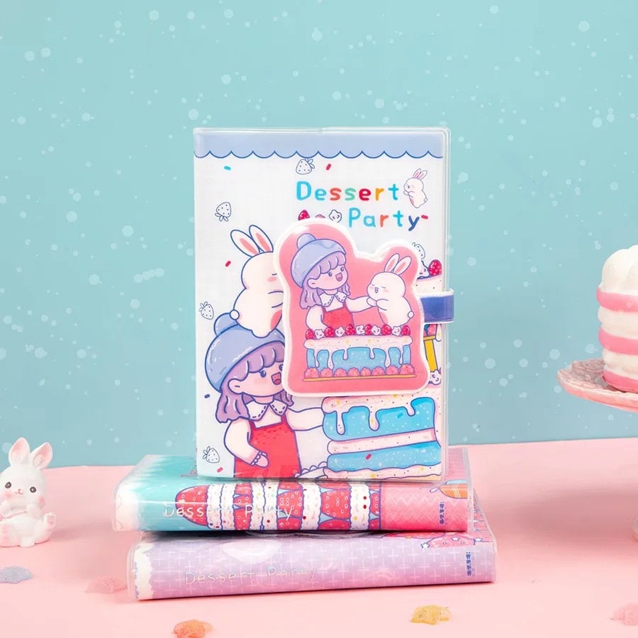 Pink Magnetic Buckle Kawaii Journal with "Dessert Party" cover design featuring a cute girl and bunny, pastel colors, and adorable illustrations on a blue background