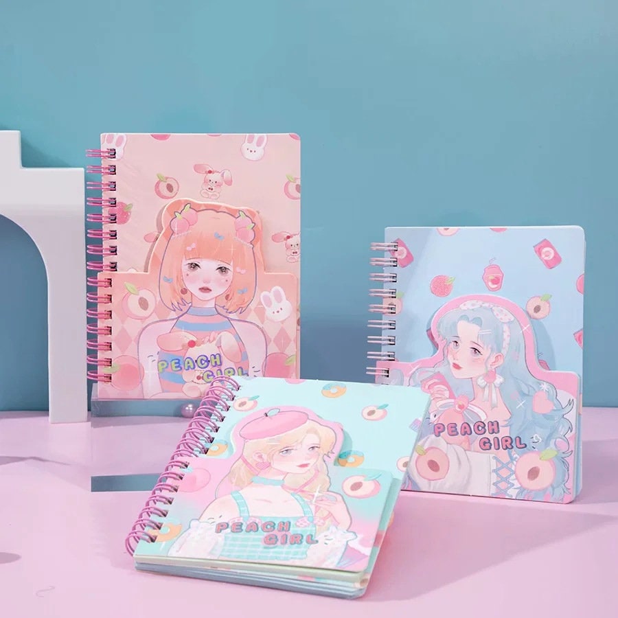 Kawaii Peach Girl Winding Journal with 180 colorful pages, featuring cute illustrations of anime-inspired girls on pastel-colored covers with peach and bunny designs.